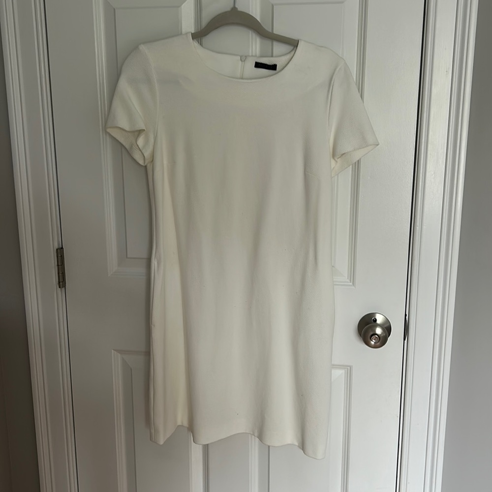 Off white dress by Italian designer Peserico